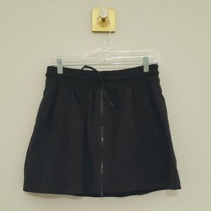 Athleta Skort Women 10 Black Zipper Pockets Tennis Pickleball Athleisure Hiking